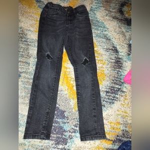 Distressed black girls jeans